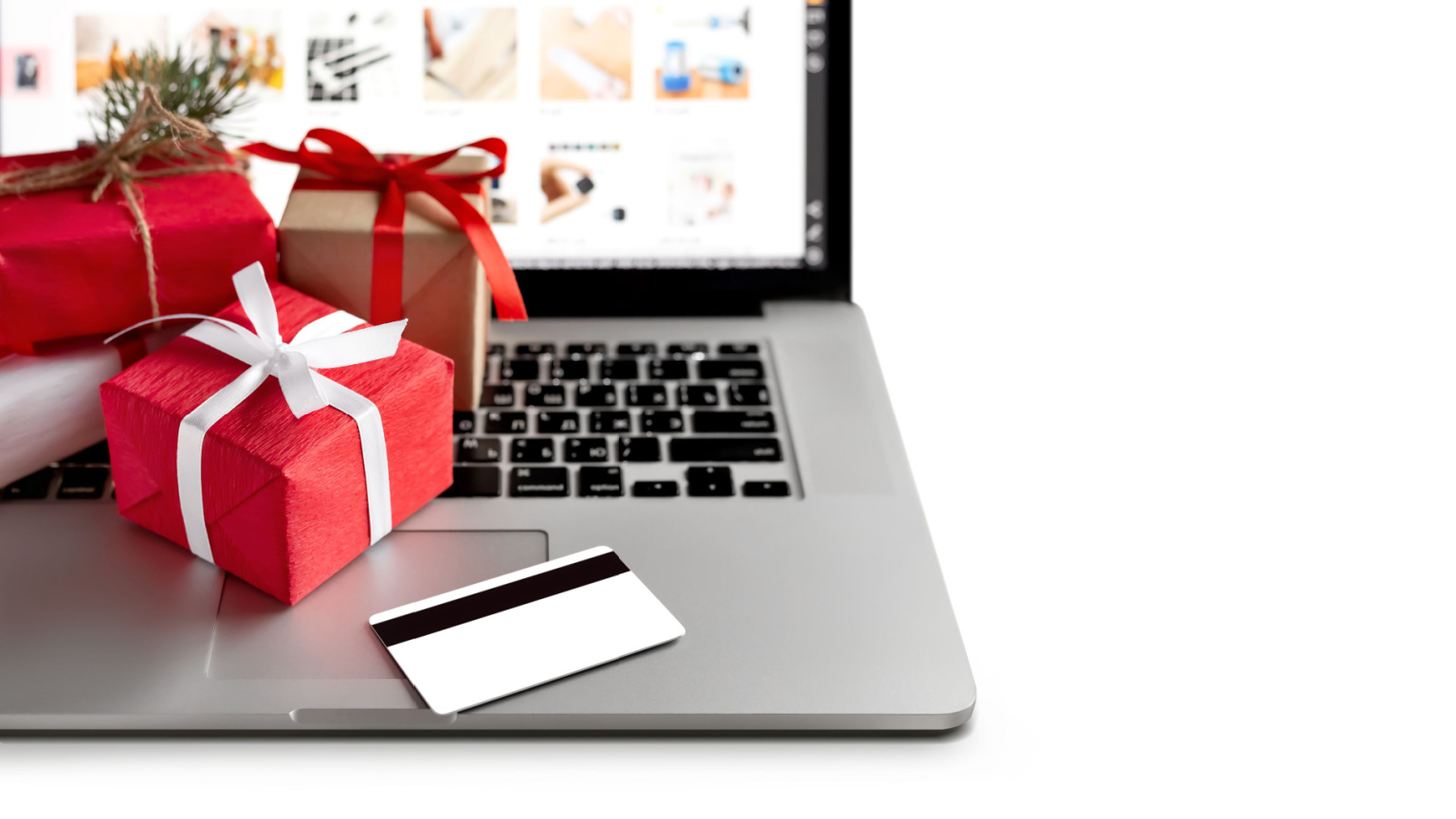 Closeup of gift and credit card on a laptop
